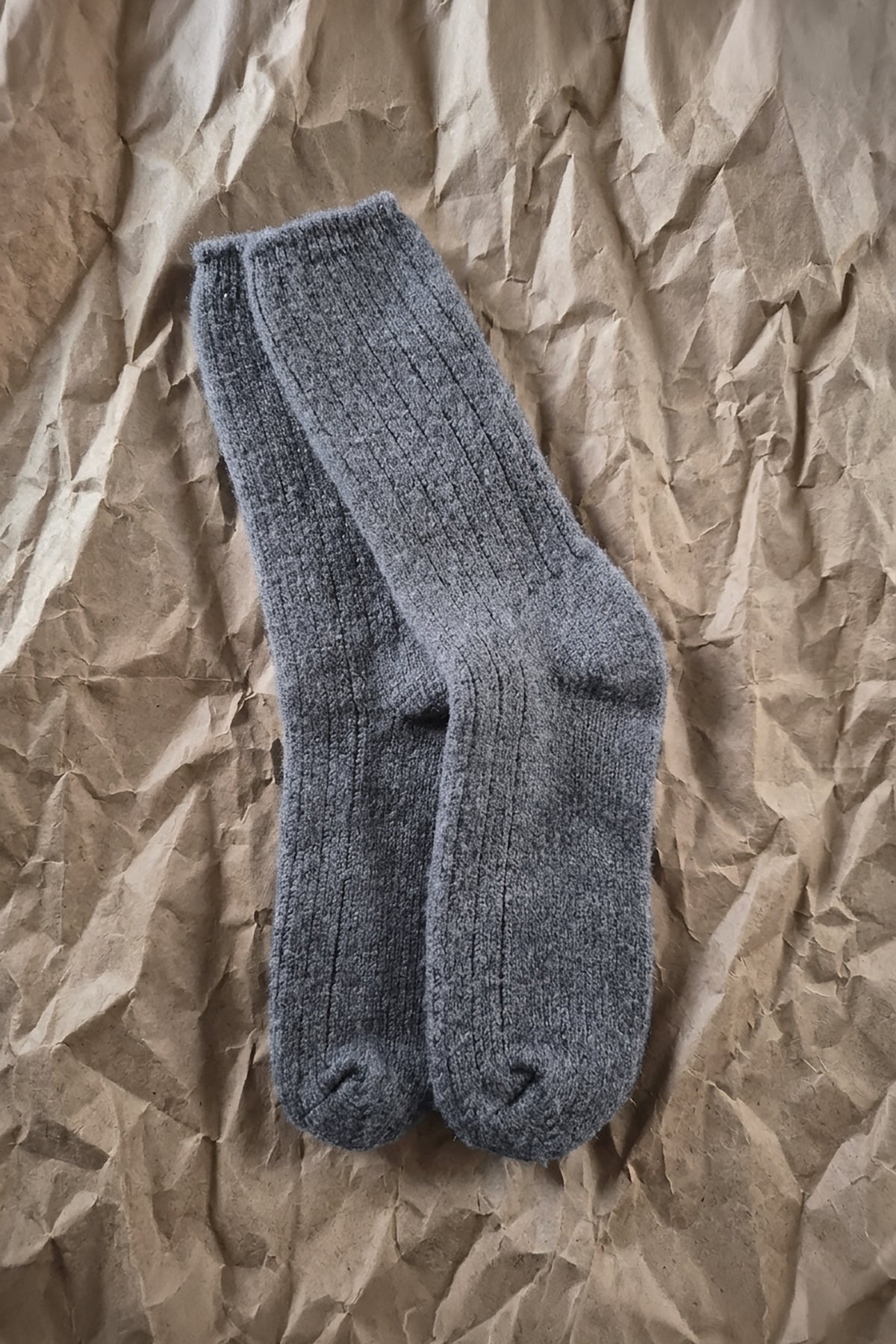 Gray merino crew socks with ribbed cuffs and knit texture