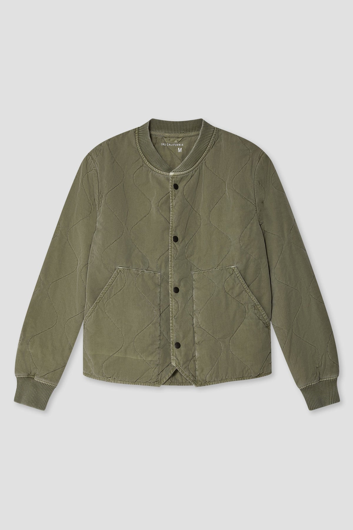Quilted bomber jacket in olive/khaki with button front and ribbed cuffs