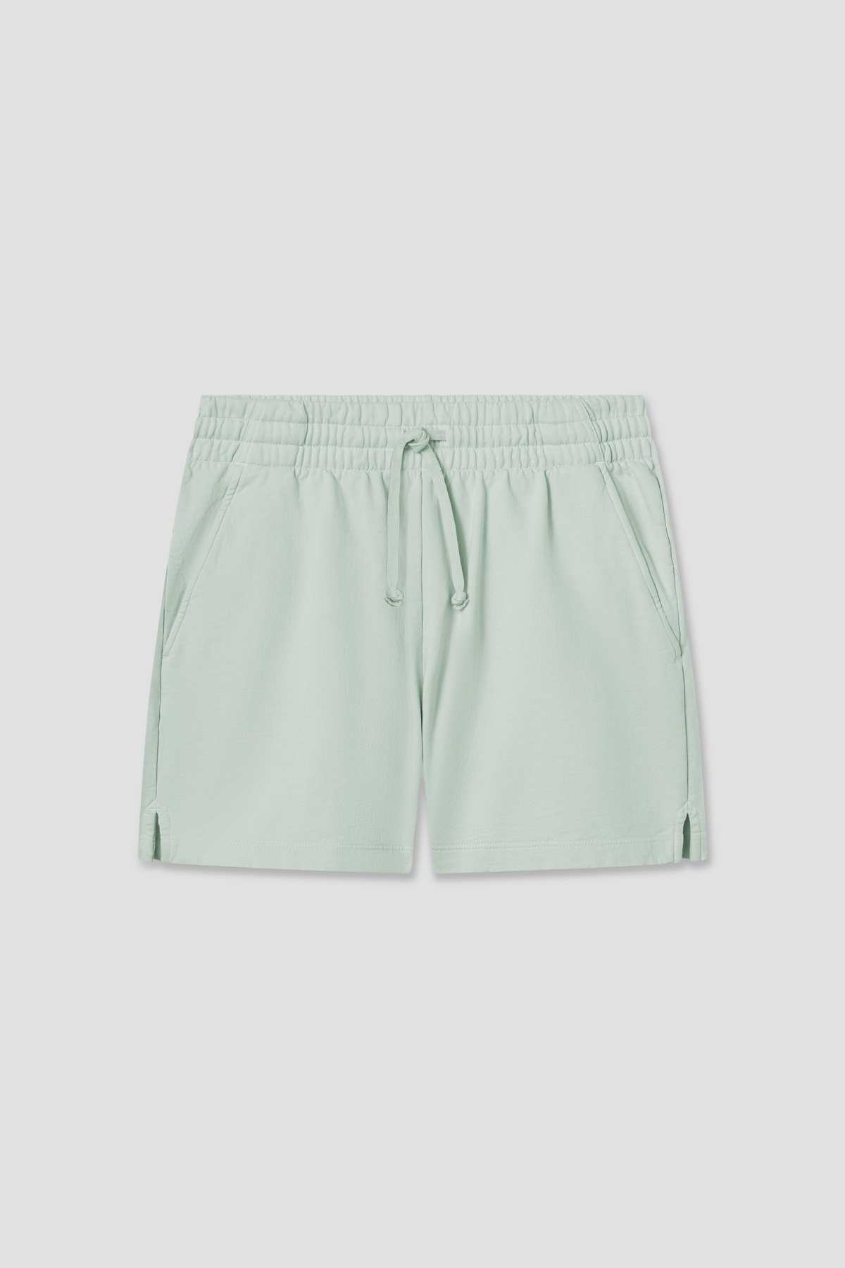 Mint green drawstring sweat shorts with elastic waistband and side pockets